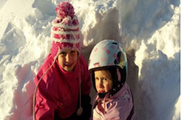 Malena and her sister two and half months after the surgery